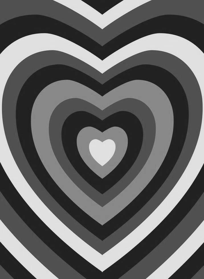 a black and white heart pattern is shown in the middle of an image with grey stripes