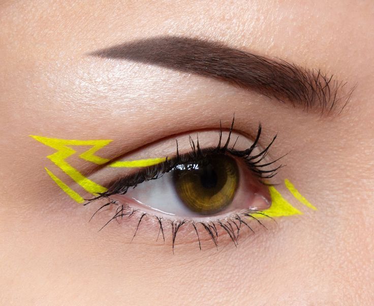 Colored Liquid Eyeliner Looks, Neon Yellow Eye Makeup, Concert Eyeliner, Lightning Eyeliner, 80s Glam Rock Makeup, Unique Eyeliner Looks, Colorful Graphic Liner, Water Activated Eyeliner, Eyeshadow Art