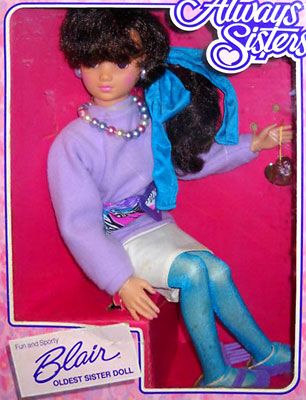 a barbie doll sitting on top of a pink box with blue tights and stockings