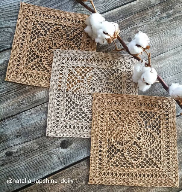 three pieces of crocheted doily with cotton on them