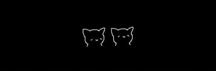 two black cats in the dark with their eyes closed