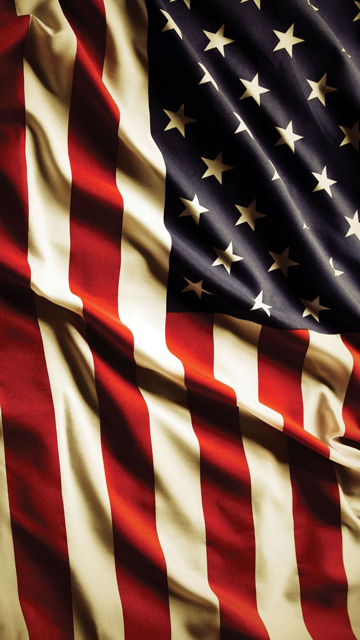 an american flag is shown in close up with the colors red, white and blue