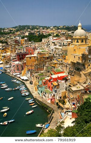 an aerial view of the city of havana with boats in the water and colorful buildings