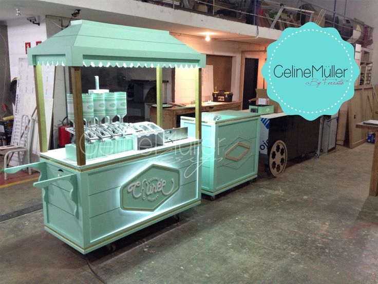 an old fashioned ice cream kiosk is on display