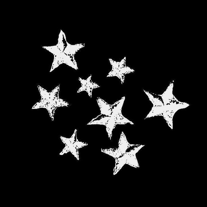 six white stars are arranged in the shape of a star