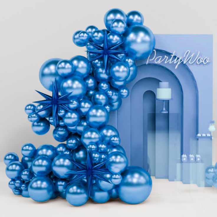 a bunch of blue balloons are in front of a card