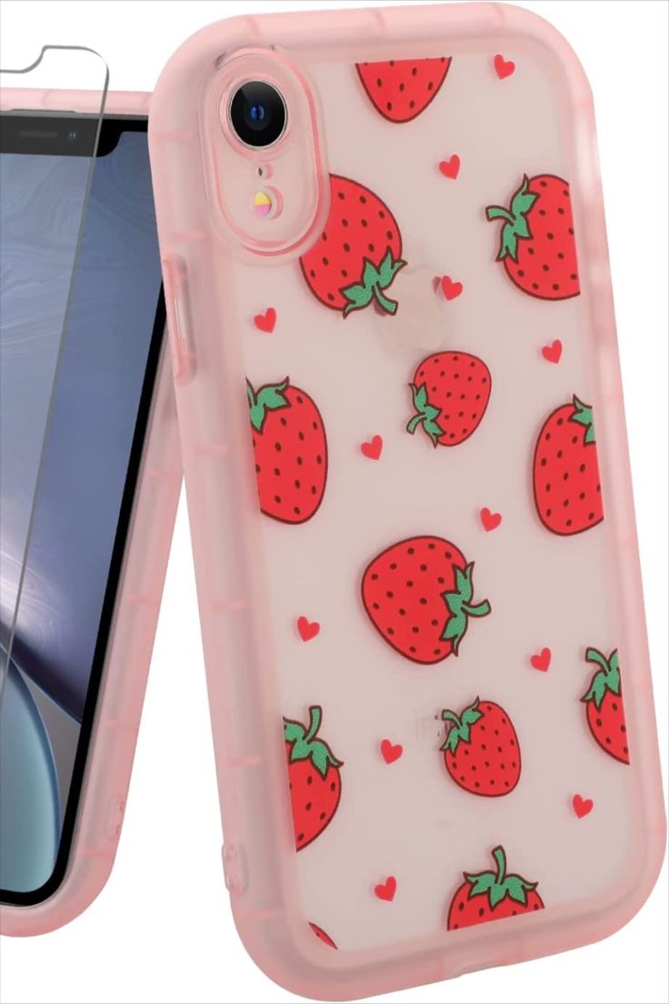 an iphone case with strawberrys and hearts on the back, next to a cell phone