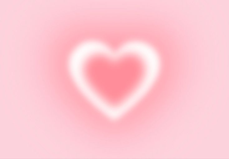a white heart on a pink background