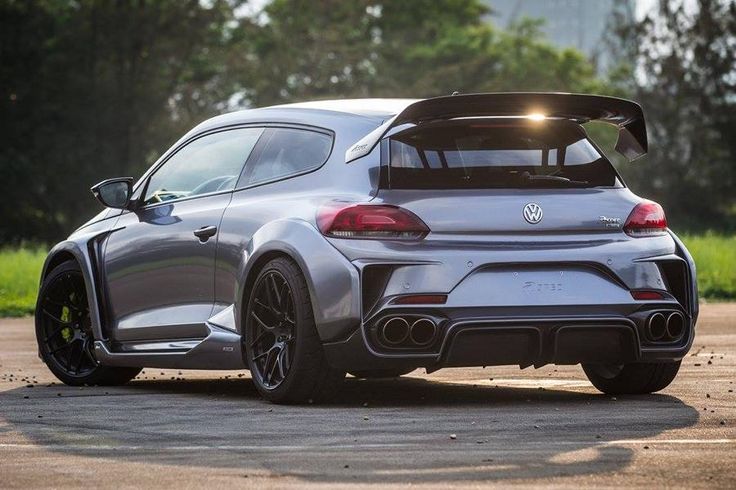 the rear end of a silver sports car