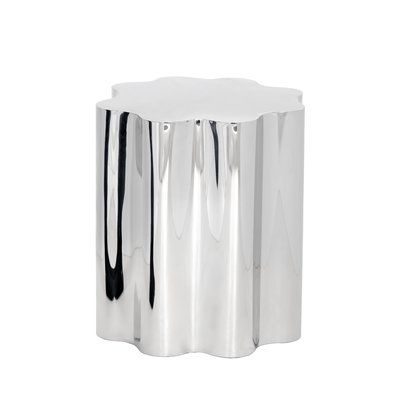 a white table with black and silver lines on it's sides, against a white background