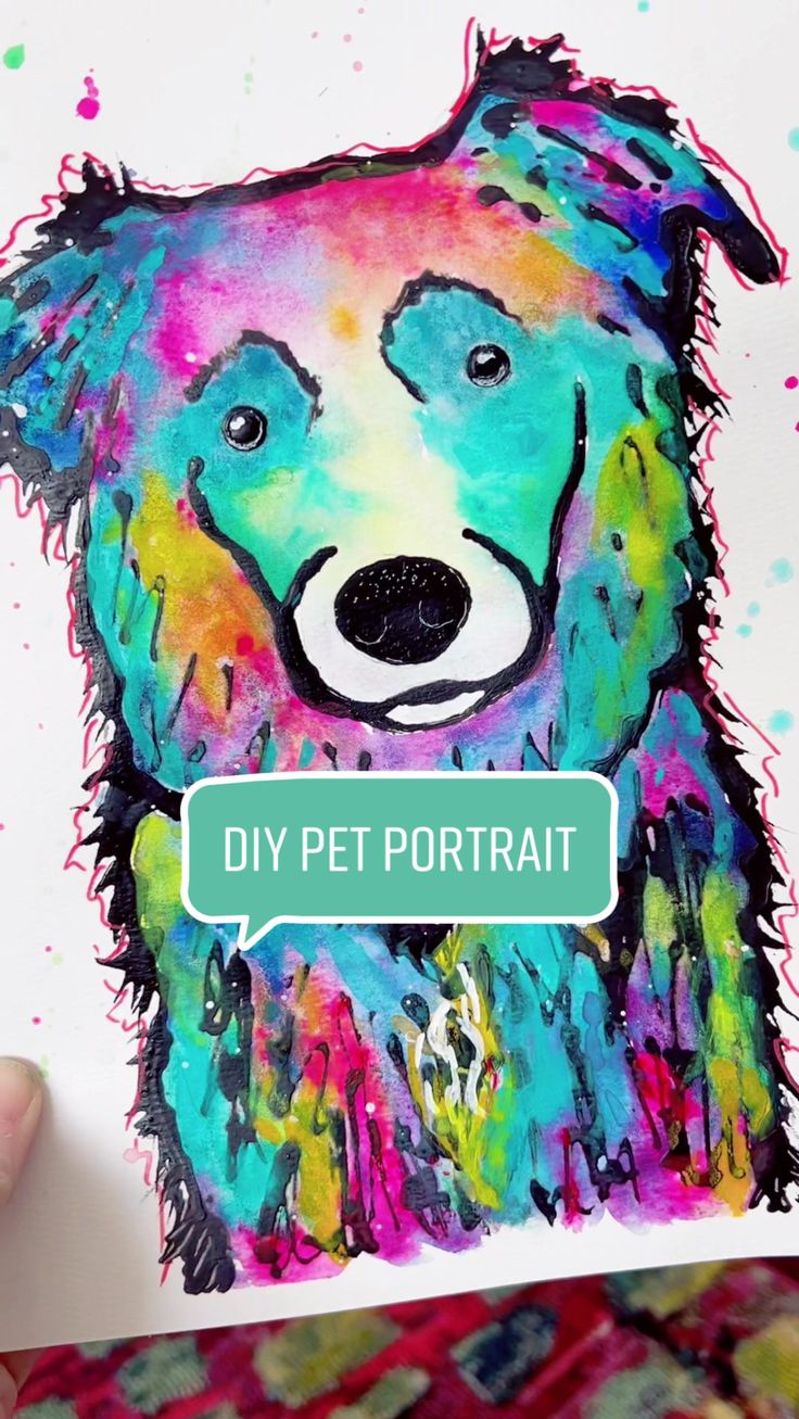 a hand holding up a card with a dog on it's face and the words diy pet portrait above it