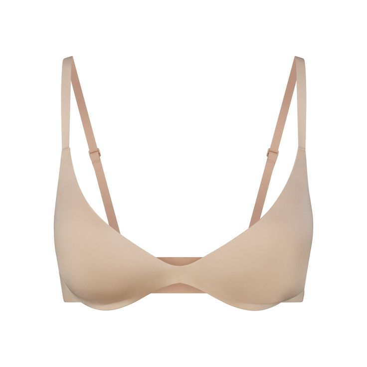 Boost your bust and maximize your cleavage in this comfortable, wireless plunge super push-up bra that adds one cup size and provides a supportive lift. Features fully adjustable straps, foam pads, wide microfiber wings for smoothing, a tonal silicone SKIMS logo at the front wing, and a hook and eye back closure. Fits true to size. | SKIMS Super Push-Up Bra | Light Neutral | 34B | Wireless Form 30d Bra, Super Push Up, Sticky Bra, Xmas Ideas, Wireless Bra, Plunge Bra, Demi Bra, T Shirt Bra, Padded Bras