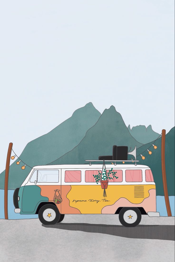 a van is parked in front of some mountains