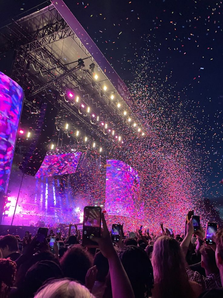 confetti is thrown in the air at a concert