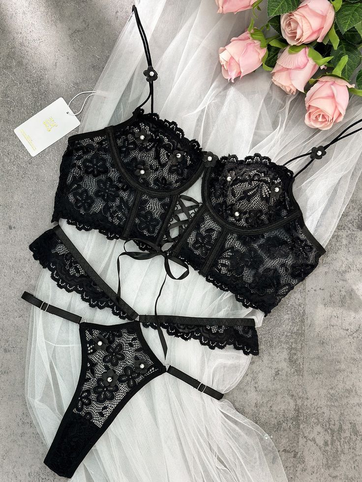 In black hue, crafted from soft lace fabric, this lingerie ensemble is adorned with delicate pearl flower patches, exuding both cuteness and allure. Its playful charm effortlessly blends with its innate sensuality, creating a captivating allure. 💙🌸✨ Material: Made of 95% nylon, 5% cotton. Exquisite Embroidery Design: The lingerie set features intricate embroidery, adding delicate patterns for an alluring appeal. Comfortable and Form-Fitting: Lightweight Padded-free Underwire Bra. Crafted from Black Pearls, Lingerie Party, Alternative Style, Lingerie Panties, Intricate Embroidery, Flower Lace, Lace Lingerie Set, Lace Lingerie, Pearl Flower