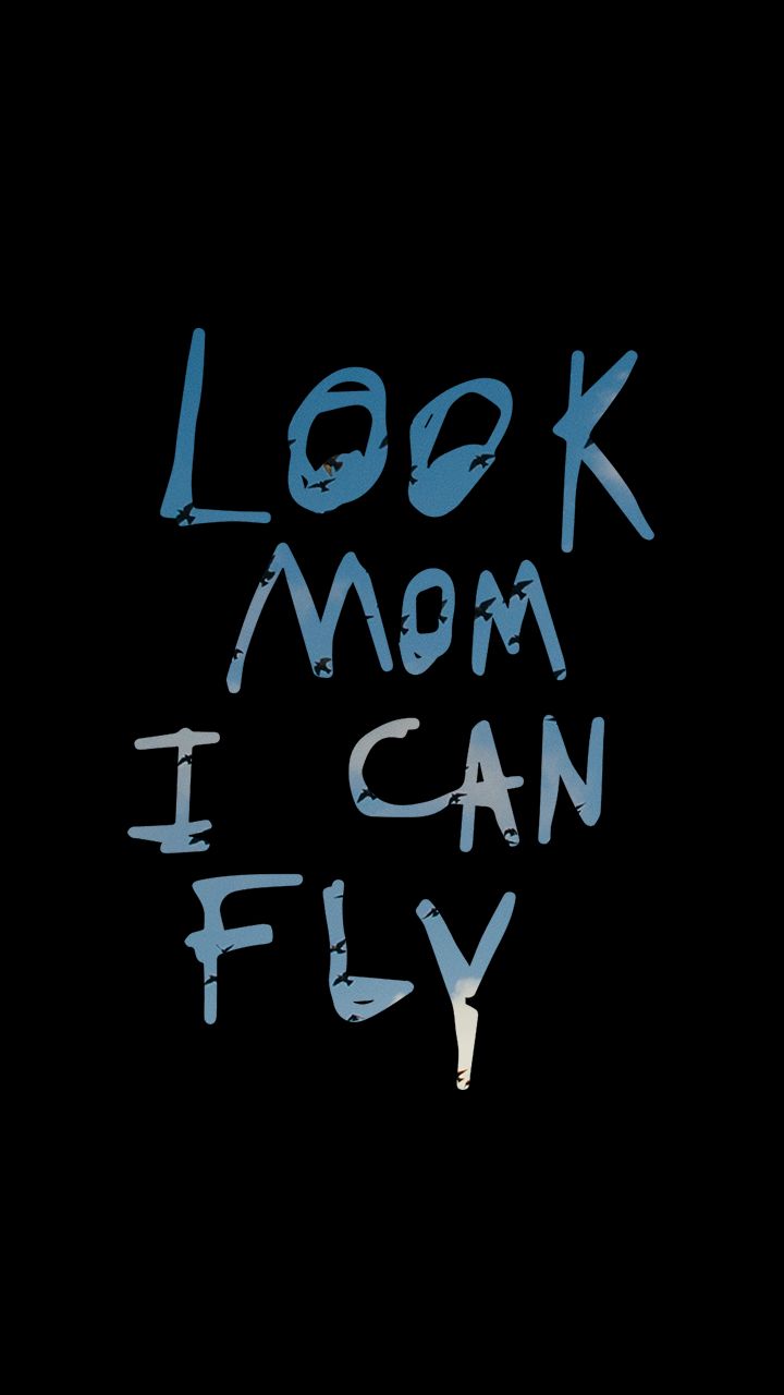 the words look mom i can fly written in white ink on a black background with blue spray paint