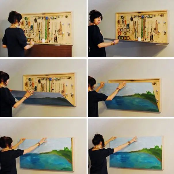 a woman is painting on the wall with many different things in front of her,