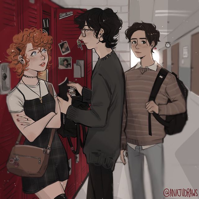 three people are standing in front of lockers