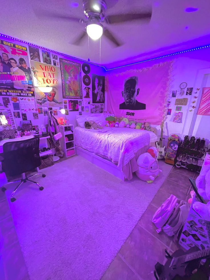 a bedroom with purple lighting and pictures on the walls, carpeted floor and ceiling