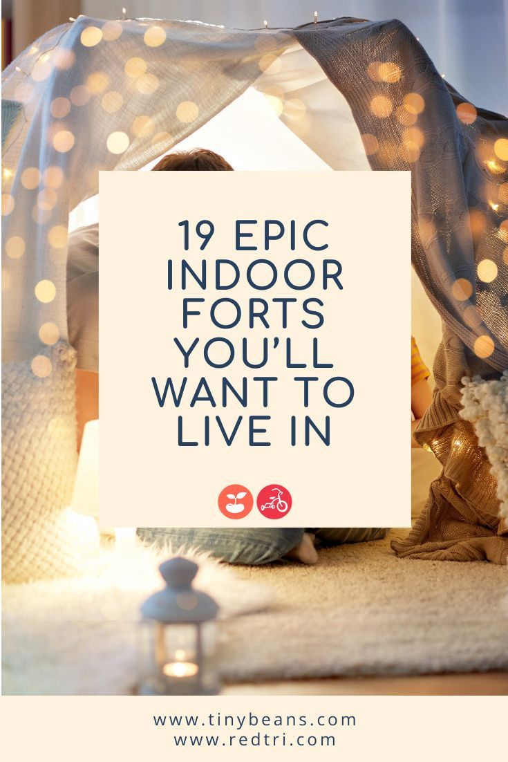 a bed with lights on it and the words 19 epic indoor forts you'll want to live in