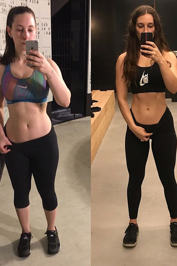 two women in black sports bras are looking at their cell phones while standing next to each other