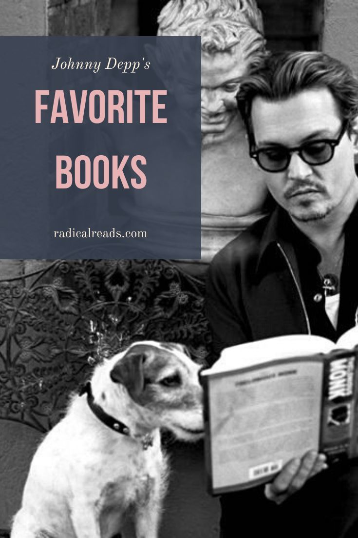 a man reading a book with his dog sitting next to him and looking at it