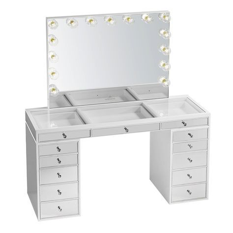 a white vanity with drawers and lights on it