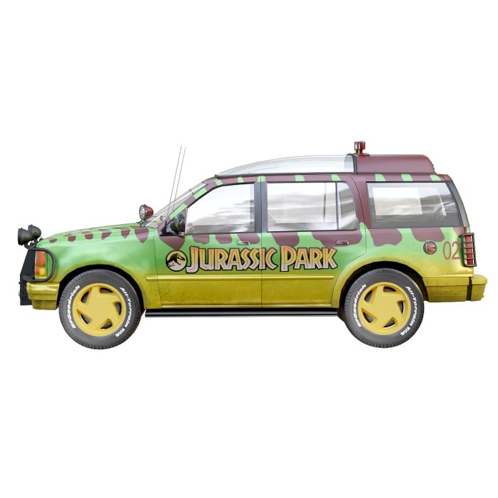 a green and yellow vehicle with the words jurasic park on it's side