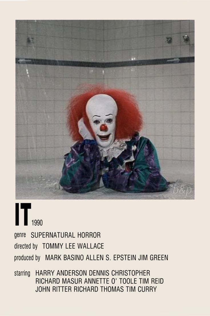 a creepy clown with red hair laying on the ground in front of a tiled wall