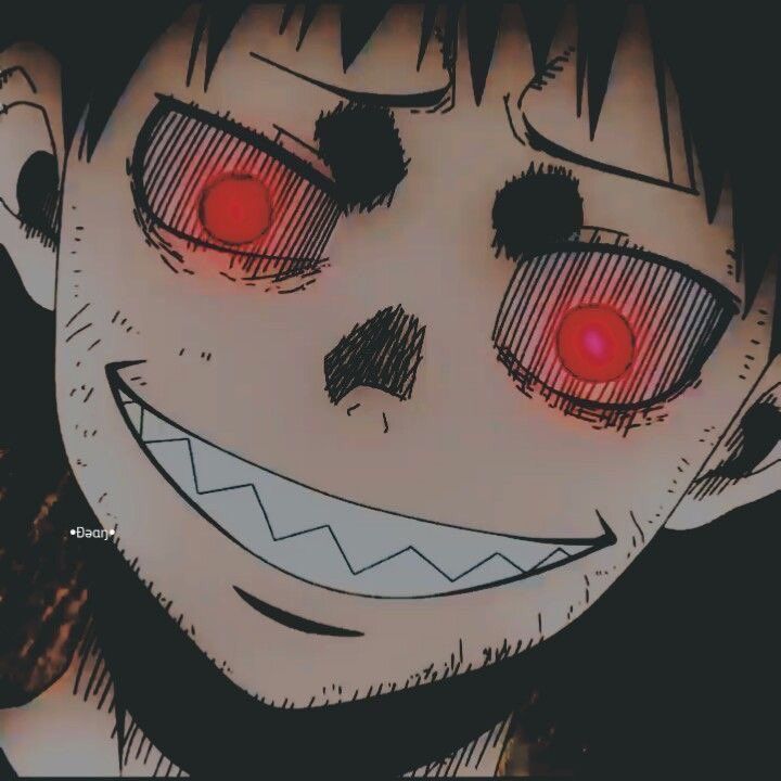 an evil looking man with red eyes and teeth