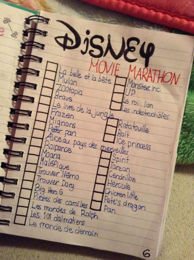a disney movie marathon is shown in a notebook