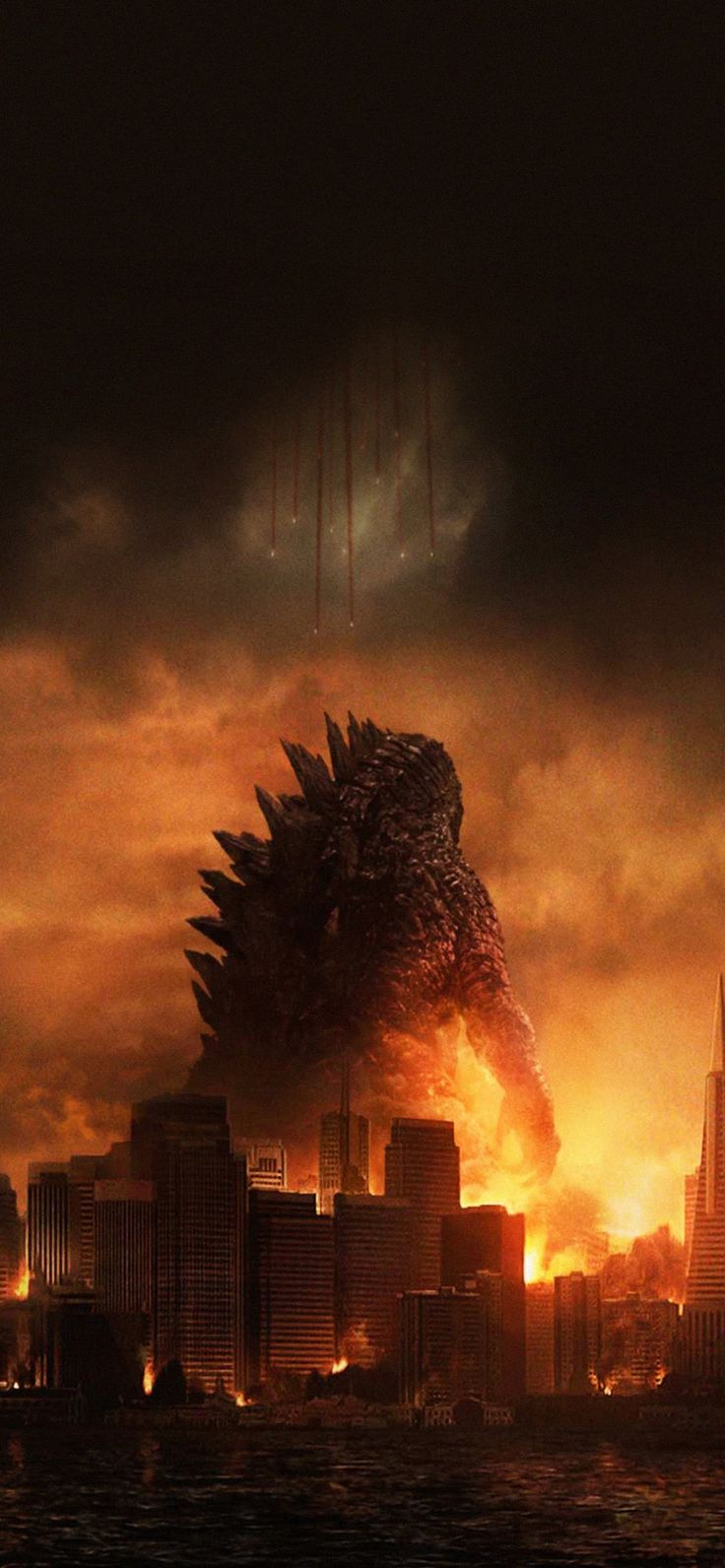 godzilla in the middle of a city with fire coming out of it's mouth