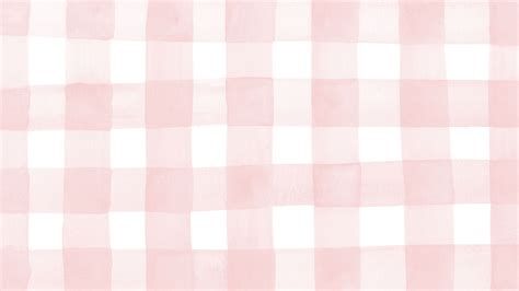 a pink and white checkered fabric with some small squares on it's side