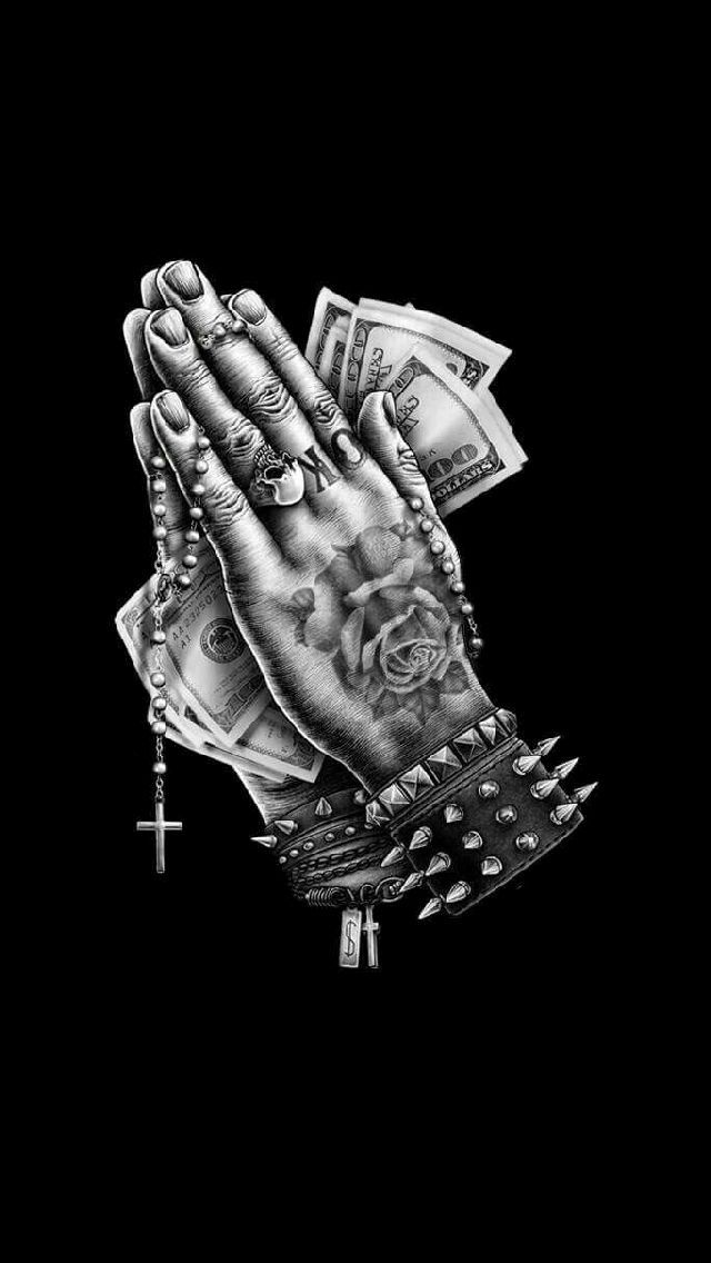 a black and white drawing of a praying hand with money on it's fingers