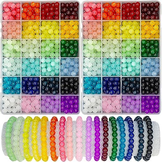 many colors of beads are arranged in rows