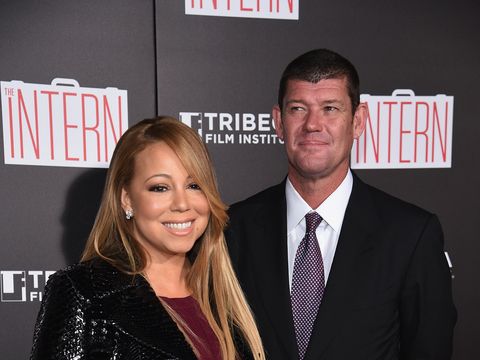 a man and woman standing next to each other in front of a black wall with the words tribe film institute on it