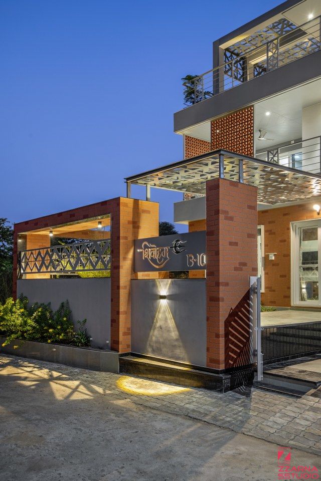 the entrance to an upscale home at night