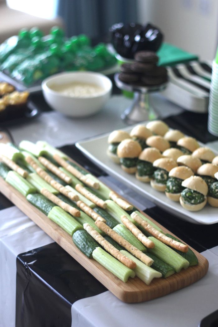 there are many appetizers on the table ready to be served at this party