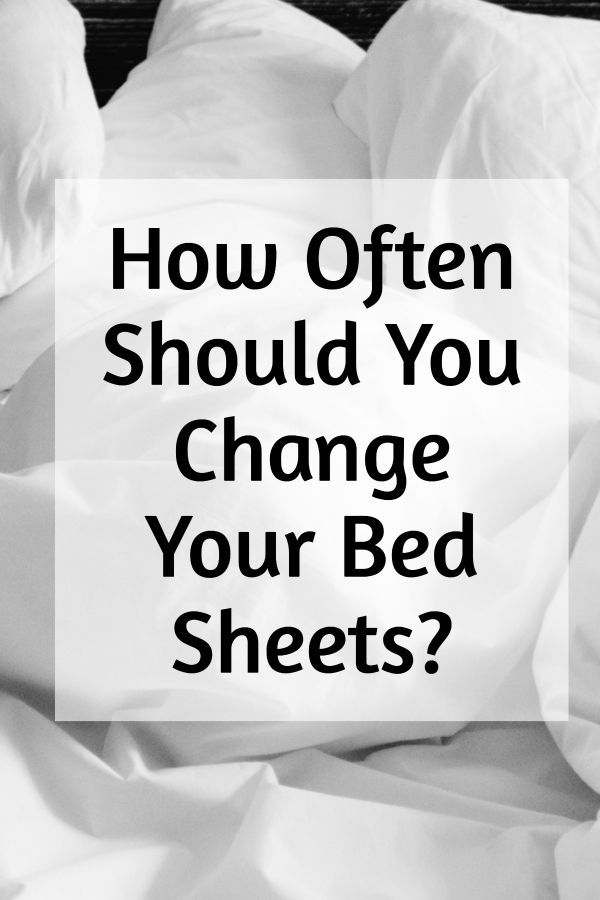 an unmade bed with the words how often should you change your bed sheets?