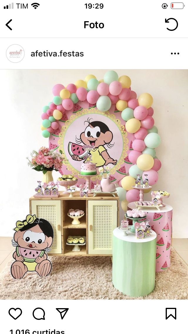 a birthday party with balloons and decorations