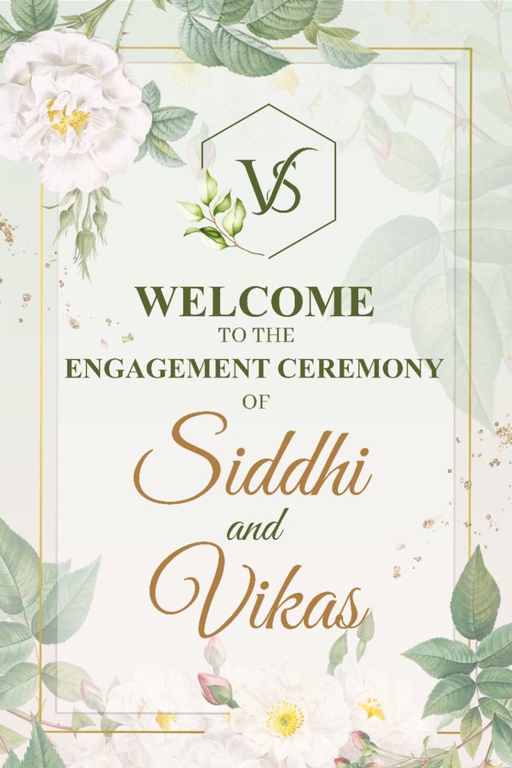 a welcome card with white flowers and green leaves on the front, in gold lettering