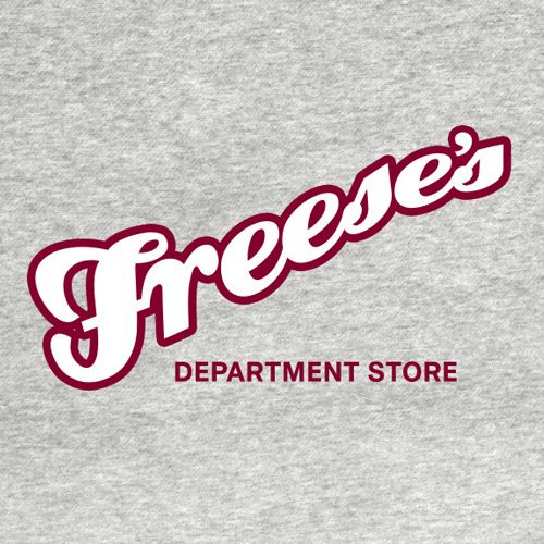 a t - shirt with the words freeze's department store in red and white