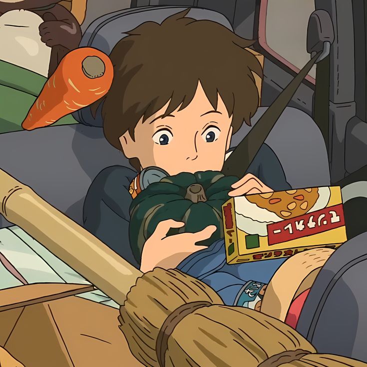 a young boy sitting in the back seat of a car holding a stuffed animal and looking at something