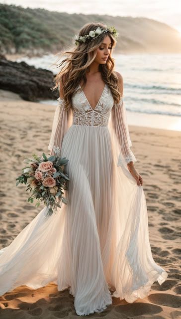 a woman in a white dress is walking on the beach wearing a flower crown and holding a bouquet
