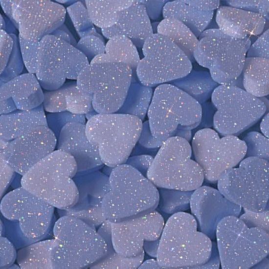 blue heart shaped candies with glitter on them