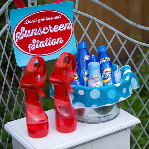 there is a bucket with toothpaste and other items in it on the table