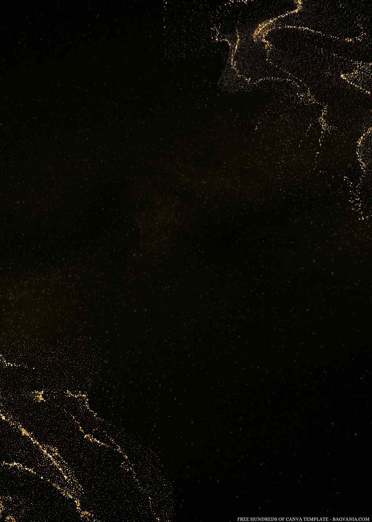 an abstract photograph of gold paint on a black background