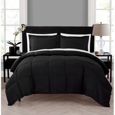 black and white comforter set in a bedroom