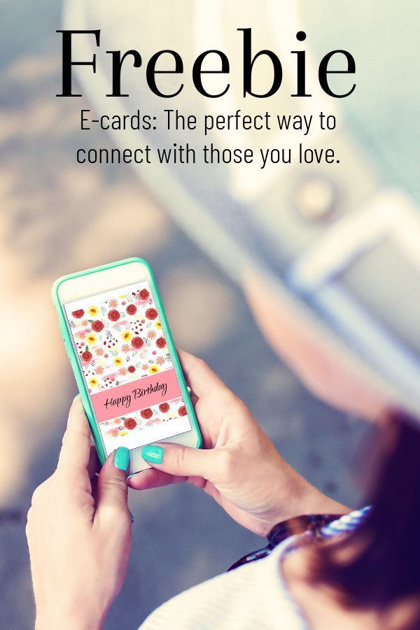a person holding a cell phone with the caption freebie e - cards the perfect way to connect with those you love