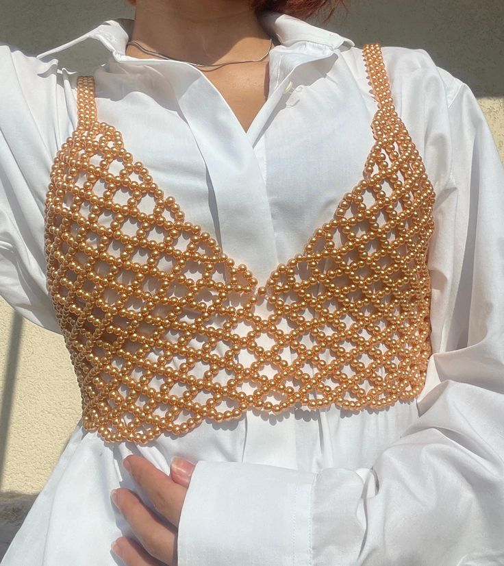 Excited to share the latest addition to my #etsy shop: Unique Bronze Pearl Crop Corset Top, Beaded Chain Lace Bralette, Rave Outfit, Hand Braided Pearl Body Chain for Woman https://etsy.me/3ZbsBEv #pearltop #beadedbralette #bronzepearlcrop #pearlbralette #uniquecorsett Beaded Top Outfit, Crop Corset Top, Pearl Body Chain, Beads Clothes, Hand Beaded Bag, Step By Step Crochet, Crochet Bralette, Rave Outfit, Beaded Top